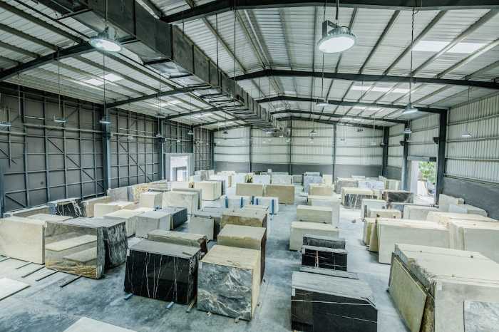KPI dashboard can track slow moving inventory like these pallets of goods in a warehouse