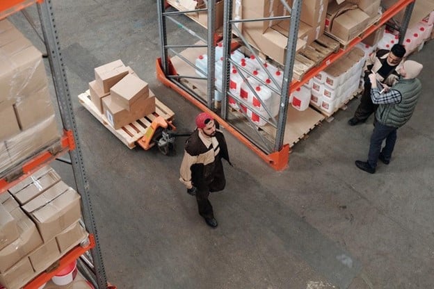 pallet jacks make it easier for warehouse workers to move multiple boxes at once.