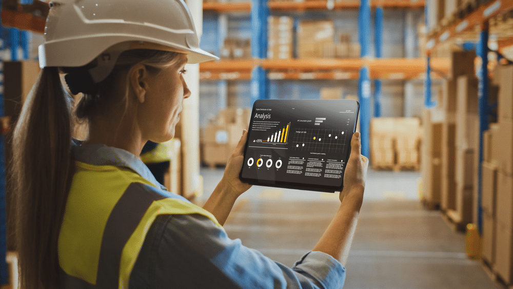 Female-warehouse-worker-using-warehouse-management-software