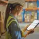warehouse worker looking at a tablet
