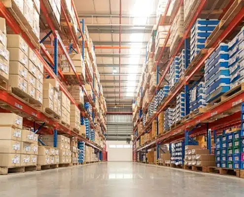 warehouse aisle with tall storage racks