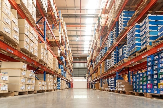 warehouse aisle with tall storage racks