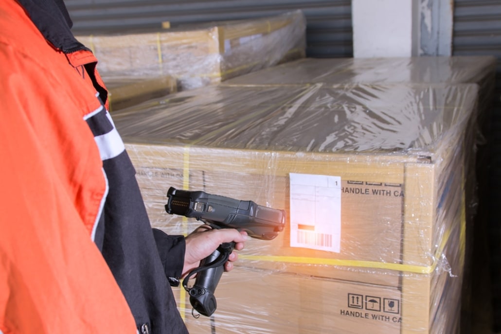 scanning a pallet to confirm the correct amount was received