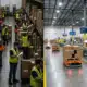 Contrasting modern warehouse with manual operations and advanced Good Enough Tech automation.