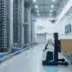 Modern warehouse fulfillment center with forklift and automated storage systems for future retail