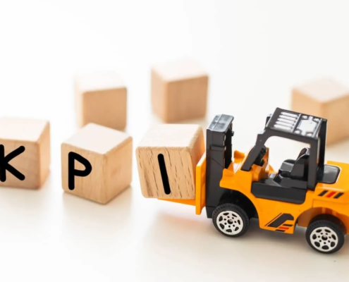 forklift moving blocks spelling out KPI
