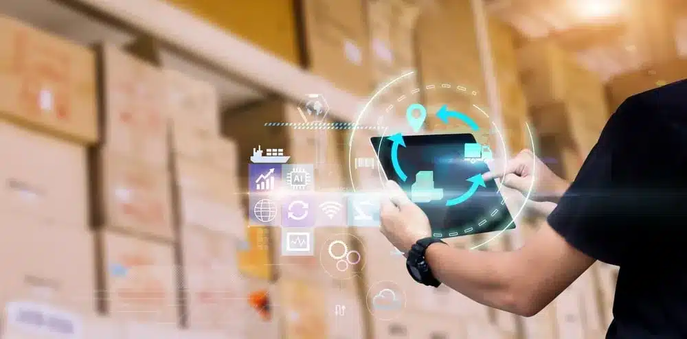 man holding 3rd party logistics billing software solution tablet in warehouse